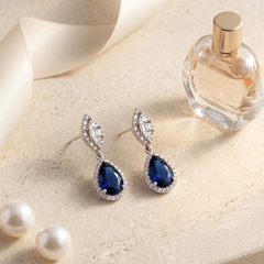 Elegant Pear-Cut Blue Sapphire Dangle Earrings - Silver Tone Halo Drops