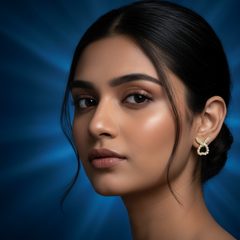 Elaro Spark Studs — Gold CZ Wing & Pearl Halo Earrings