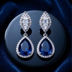Elegant Pear-Cut Blue Sapphire Dangle Earrings - Silver Tone Halo Drops