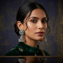 EL ARO Oxidised Silver Sunflower Jhumka Earrings with Green Peacock Eye Stone