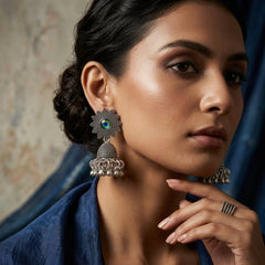 EL ARO Oxidised Silver Sunflower Jhumka Earrings with Green Peacock Eye Stone
