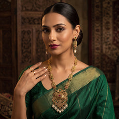 Elaro Gold Kundan Lotus Choker Necklace Set with Ruby Bead Drops