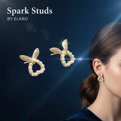 Elaro Spark Studs — Gold CZ Wing & Pearl Halo Earrings