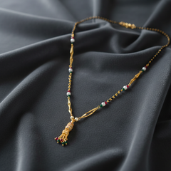 Elaro Gold Meenakari Lotus Mangalsutra with Ruby & Emerald Drops