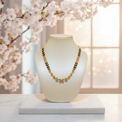 Elaro Gold-Plated Black Bead Mangalsutra with Floral Gold Pendant