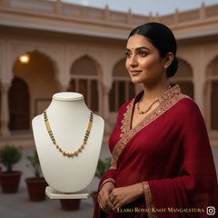Elaro Gold-Plated Black Bead Mangalsutra with Floral Gold Pendant