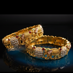 Elephant Motif Nakshi Kada pair  and Rajwadi Mother of Pearl Meenakari Kada pair.