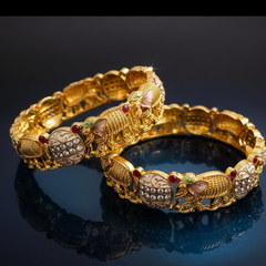 Elephant Motif Nakshi Kada pair  and Rajwadi Mother of Pearl Meenakari Kada pair.
